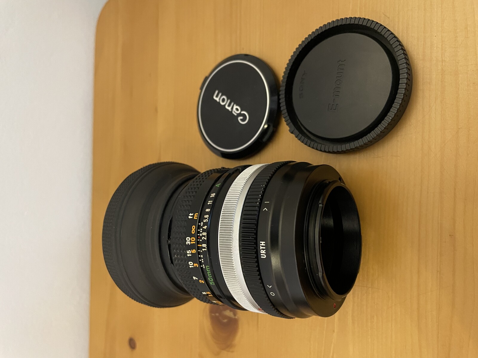 Objectif Canon 50mm f/1.8 argentique monture sony E et canon FD - Photo 2 sur 3